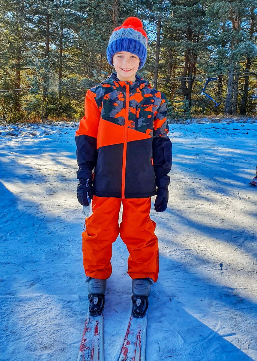 Vladimir standing on skis in the snow at Kupres Bosnia